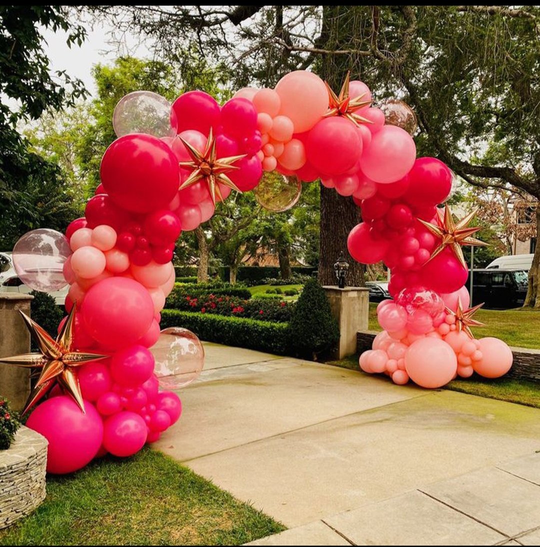 Pink and gold organic balloon arch for wedding functions